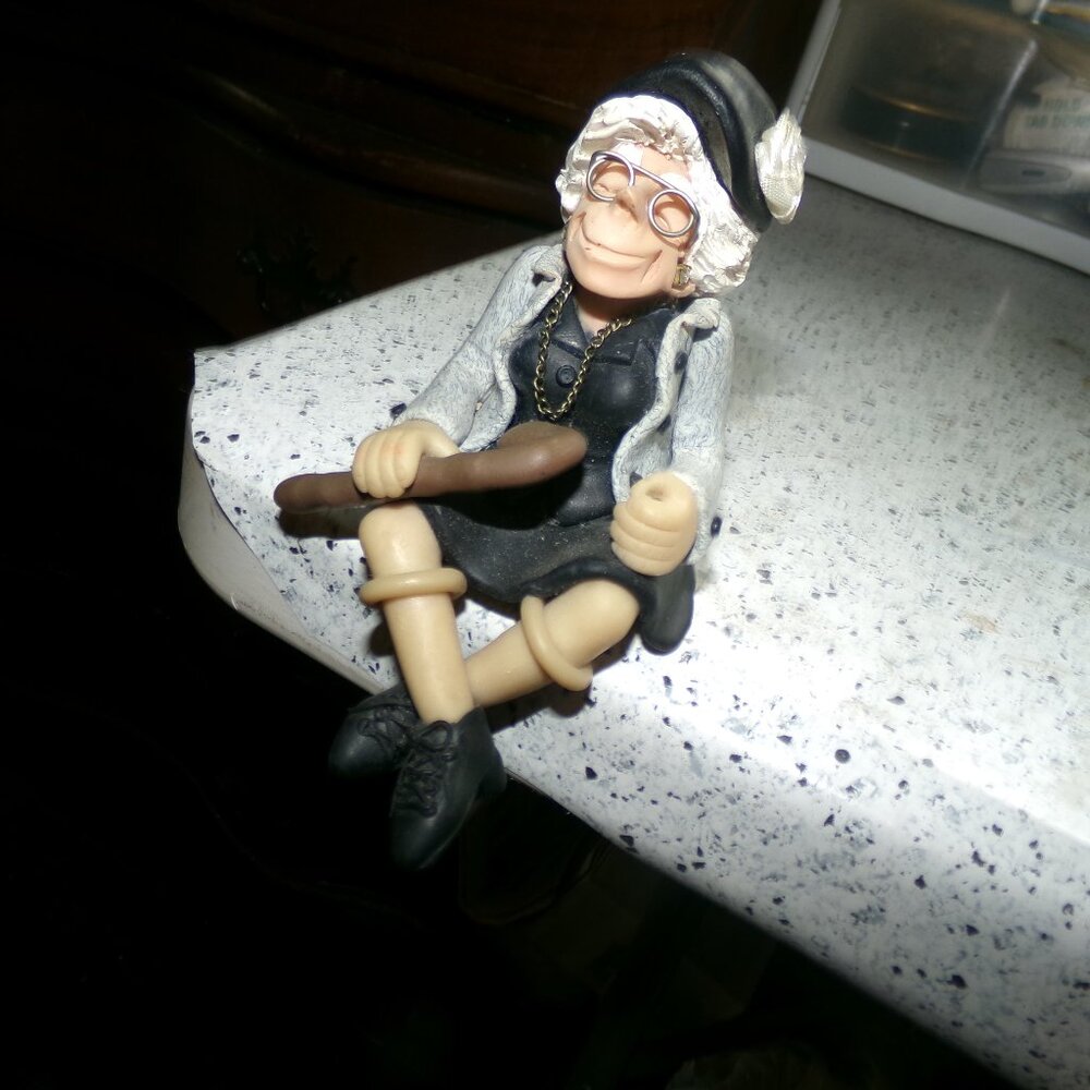 D Manning old lady over the hill limited edition shelf sitter.